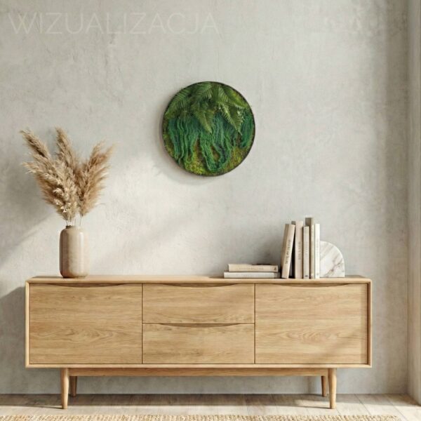 Okrągły obraz z mchu płaskiego.